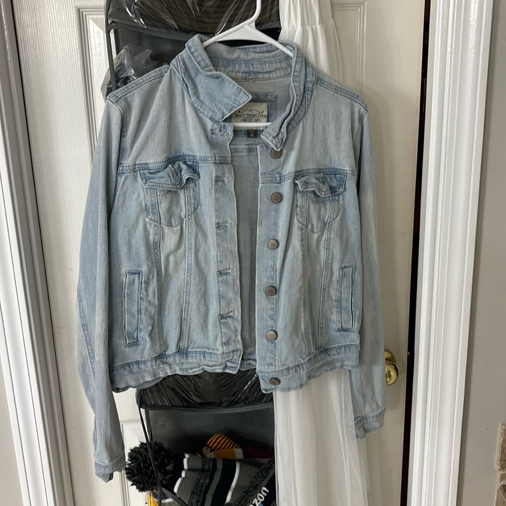 Light colored blue Jean jacket